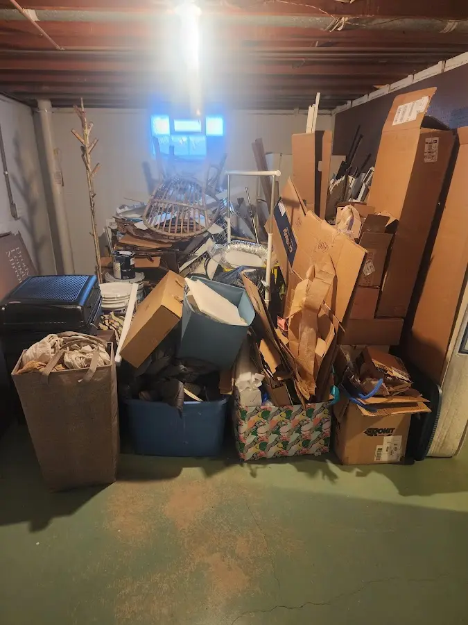 Roll-off dumpster container at job site for Yard Waste Dumpster Rental in Ash